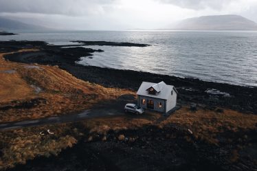 white house near shore